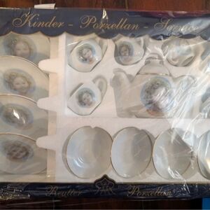 Shirley Temple Porclein Child's Tea Set, made in Germany by Reutter. (Bin #9)